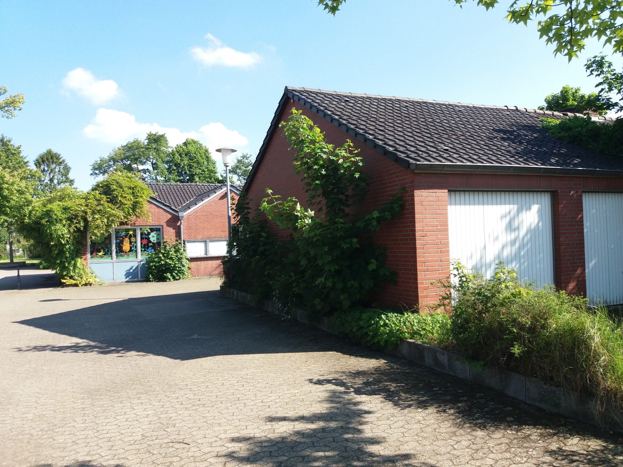 Foto: Ansicht der Bestandsgebäude auf dem Plangrundstück